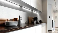 Выбор подсветки рабочей зоны кухни - лучше лента или светильники?