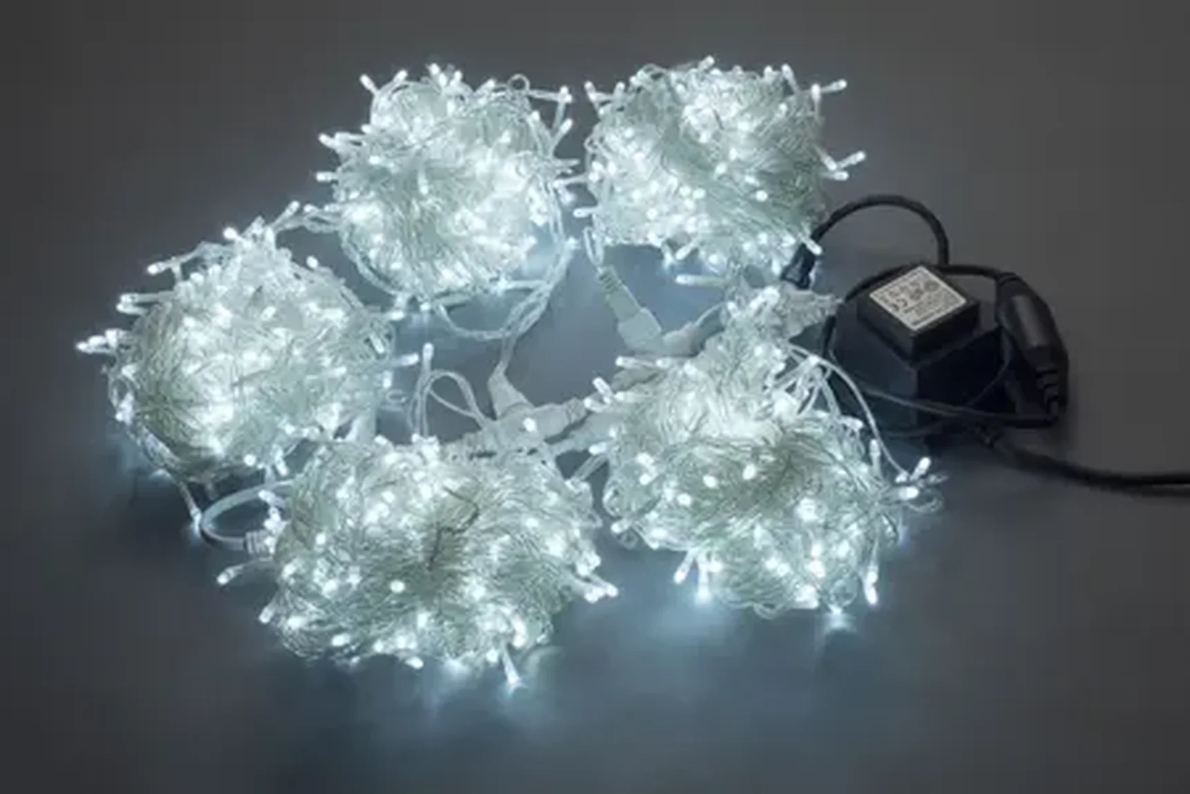 LED-PLS-200*5-20M*5-24V-W/C-F(W) (20) 5 нит., белый c F(W) на прозр. пров. с 230V/24V/60W трансф