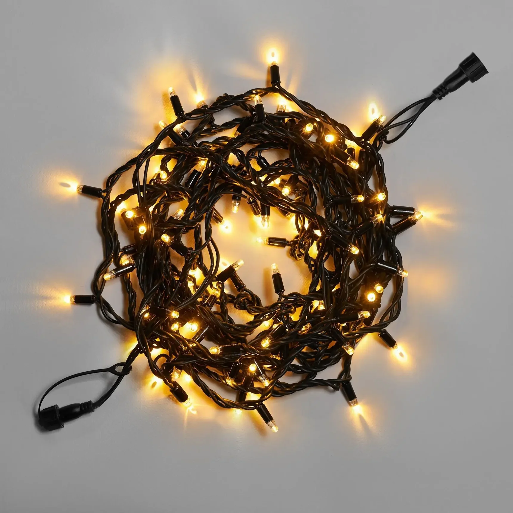 Светодиодная гирлянда INOXHUB Нить 10м, 100 LED, соединяемая, 24В, IP65, чёрный резиновый провод 3.3мм, ТЁПЛАЯ БЕЛАЯ