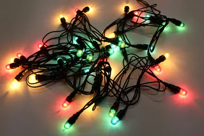 PLW-200-240V Гирлянда фиксинг 30м, IP65, 240V, 550Вт, Mульти лампы R/G/B/Y(200)/черный провод