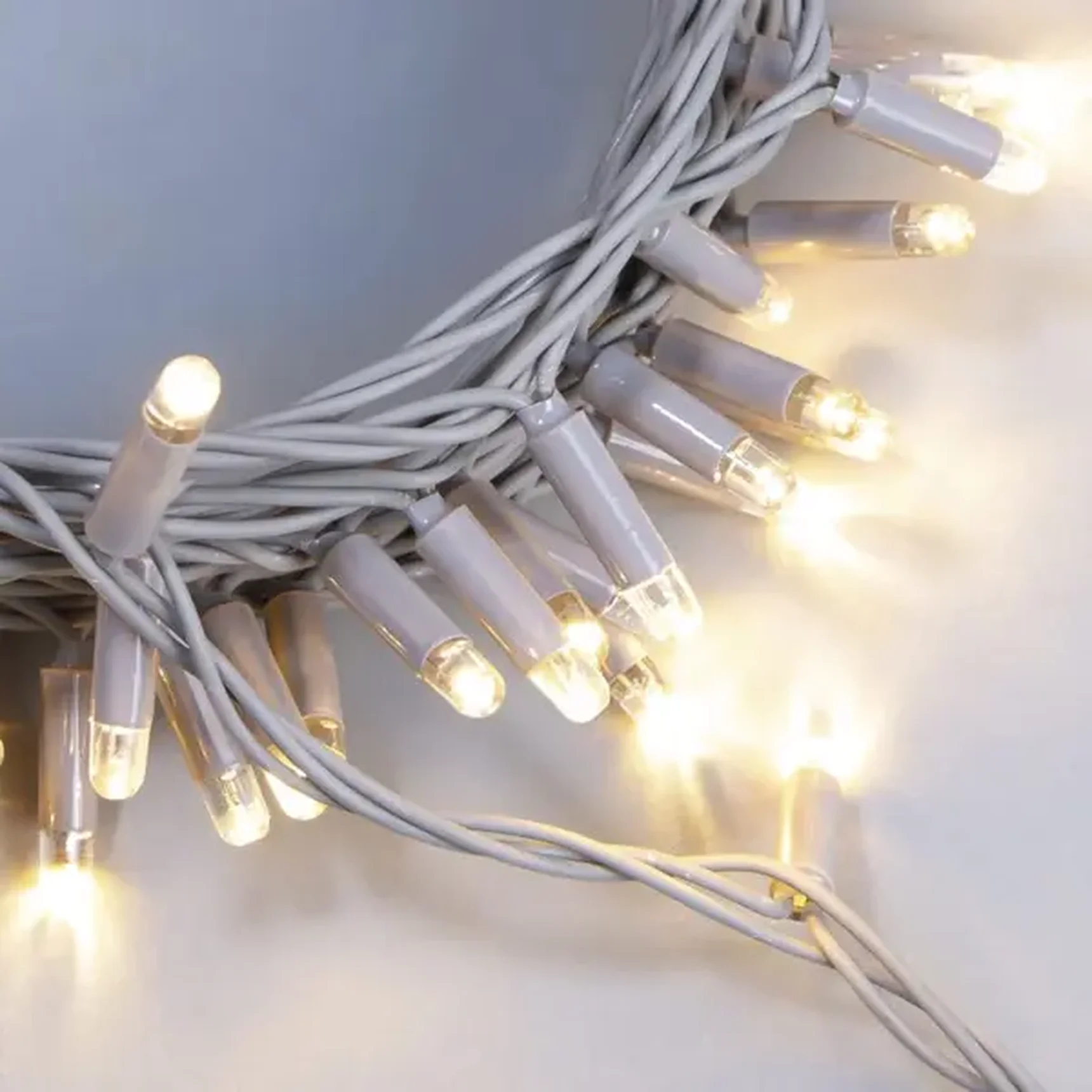 Гирлянда Нить 10м Тепло-Белая 24В, 100 LED, Провод Серый Каучук 2,3мм, IP65