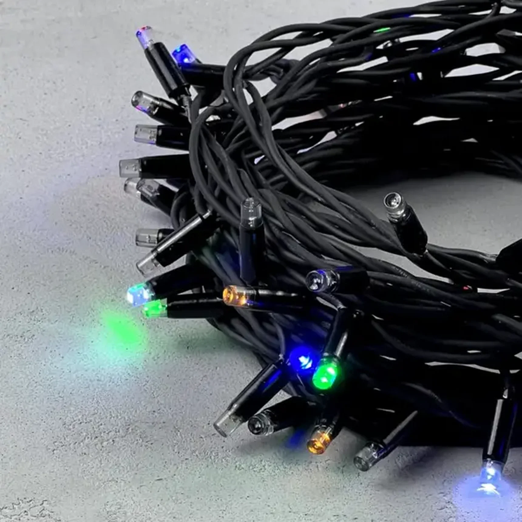 Гирлянда Нить 10м Разноцветная с Мерцанием Каждого Диода 220В, 75 LED, Провод Черный Каучук, IP65